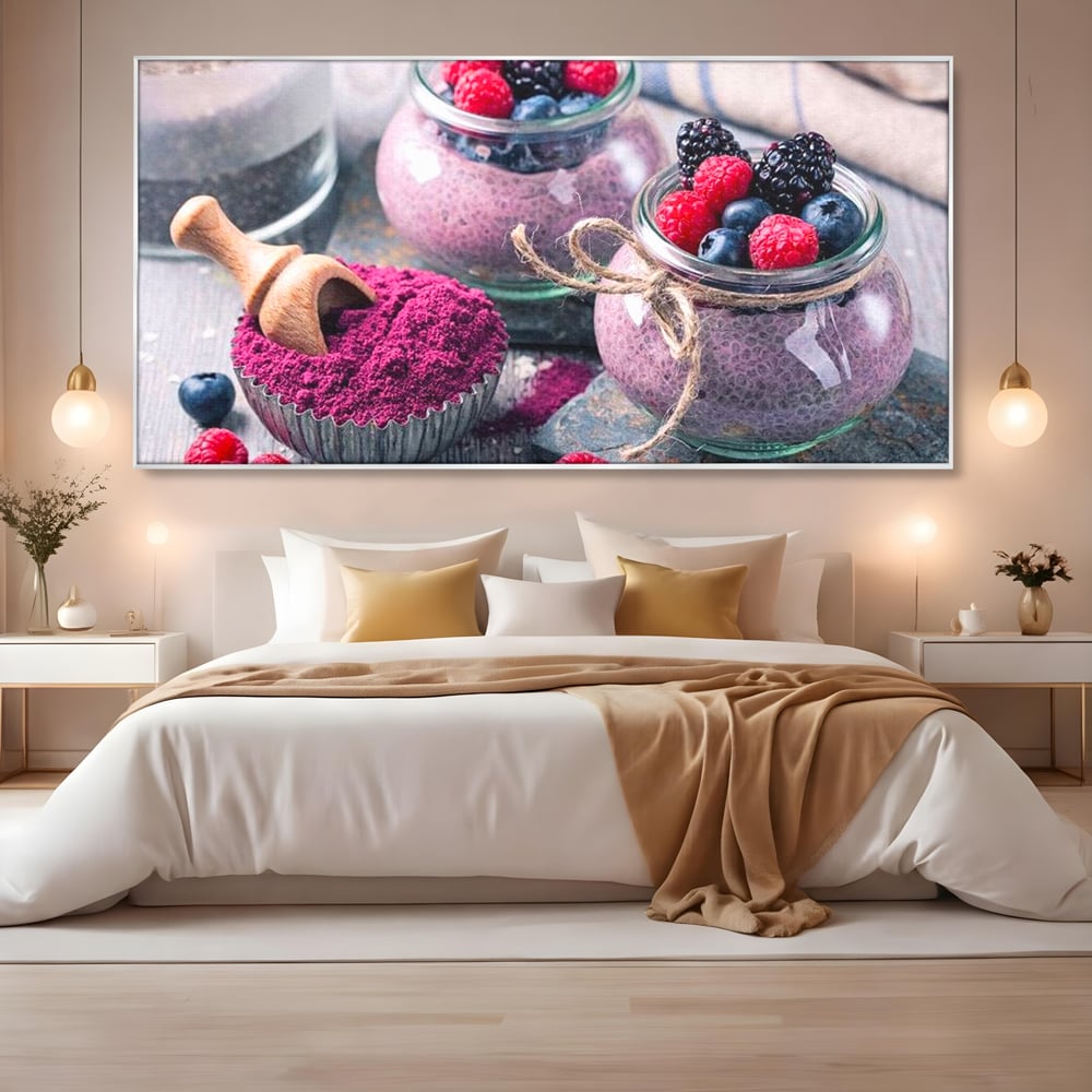 Tablou canvas cu natura moarta cu desert si fructe de padure, in rama de aluminiu argintiu, pe perete intr-un dormitor